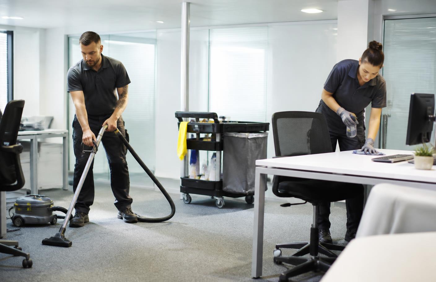Cleaners working in an office